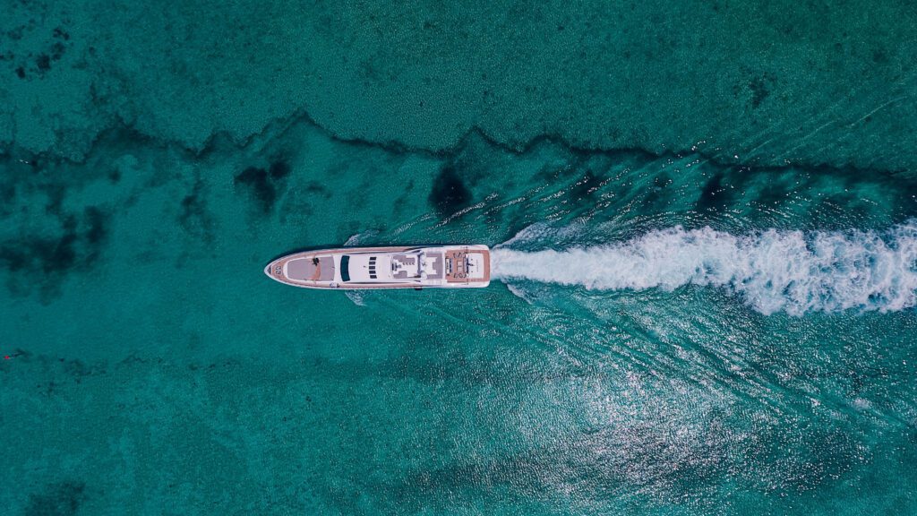 A charter yacht cruising through the clear blue waters. 